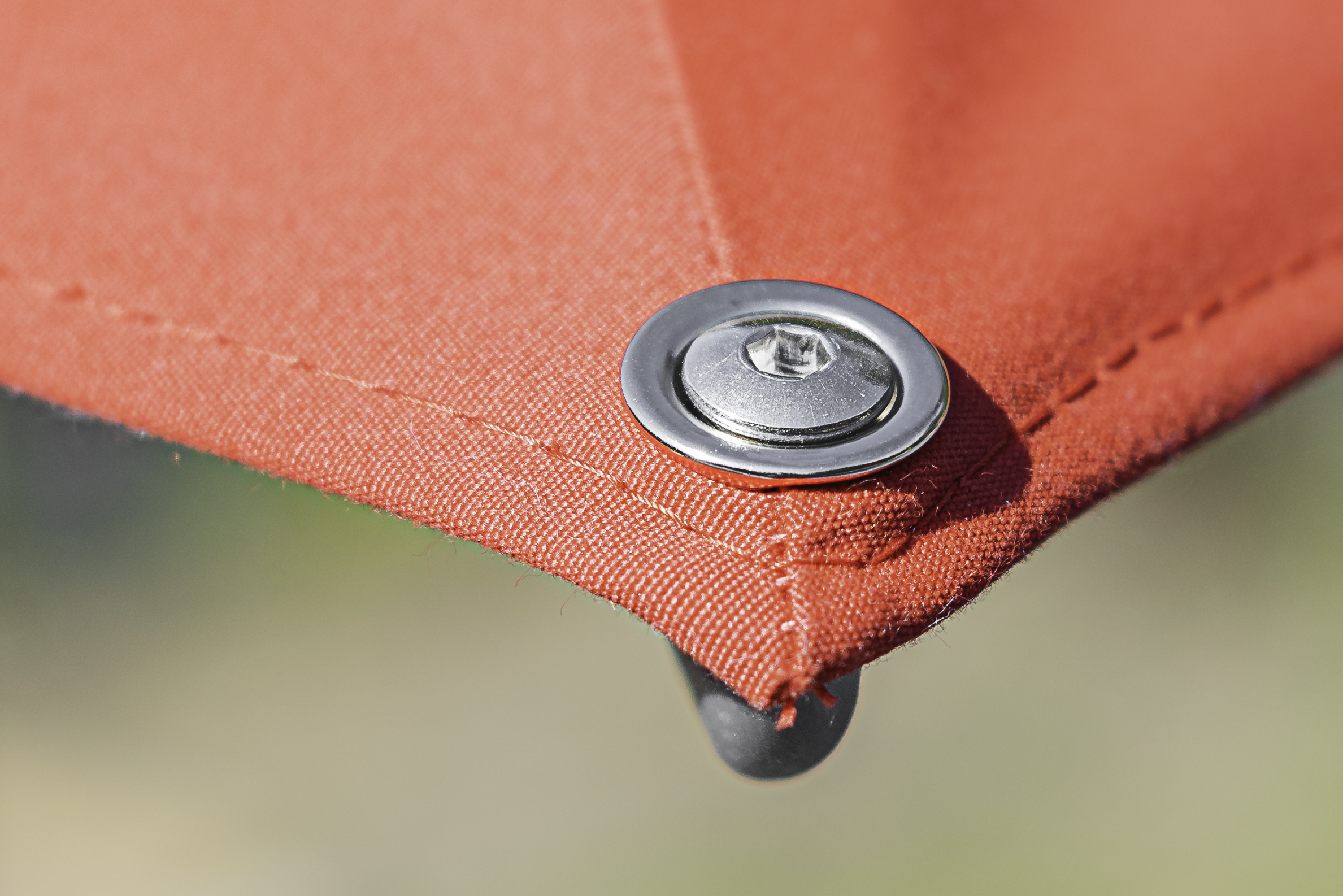 Why We Recommend 9 oz. Awning-Grade Fabrics for Shade Products